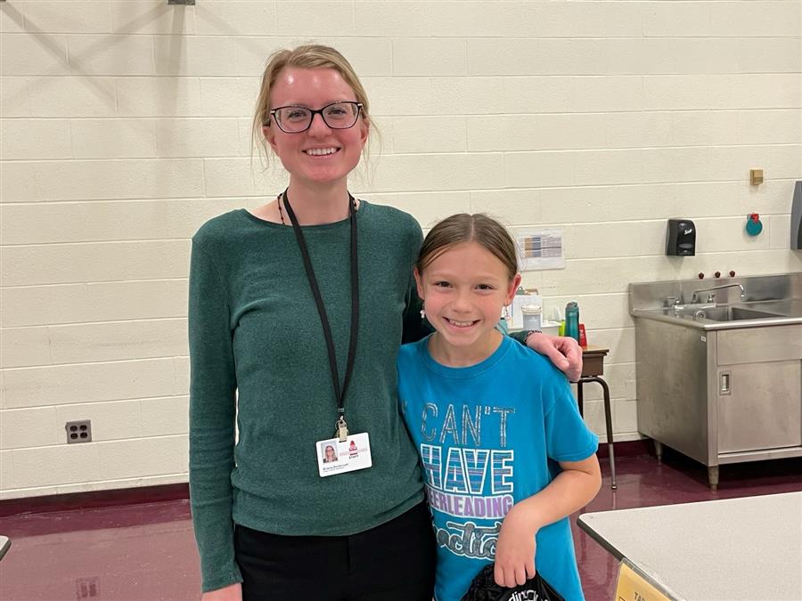 4th Grade Teacher, Ms. Zembruski, with a student on Family Read Night.